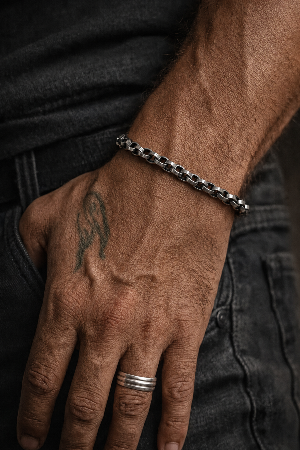 Steel anchor chain bracelet on wrist