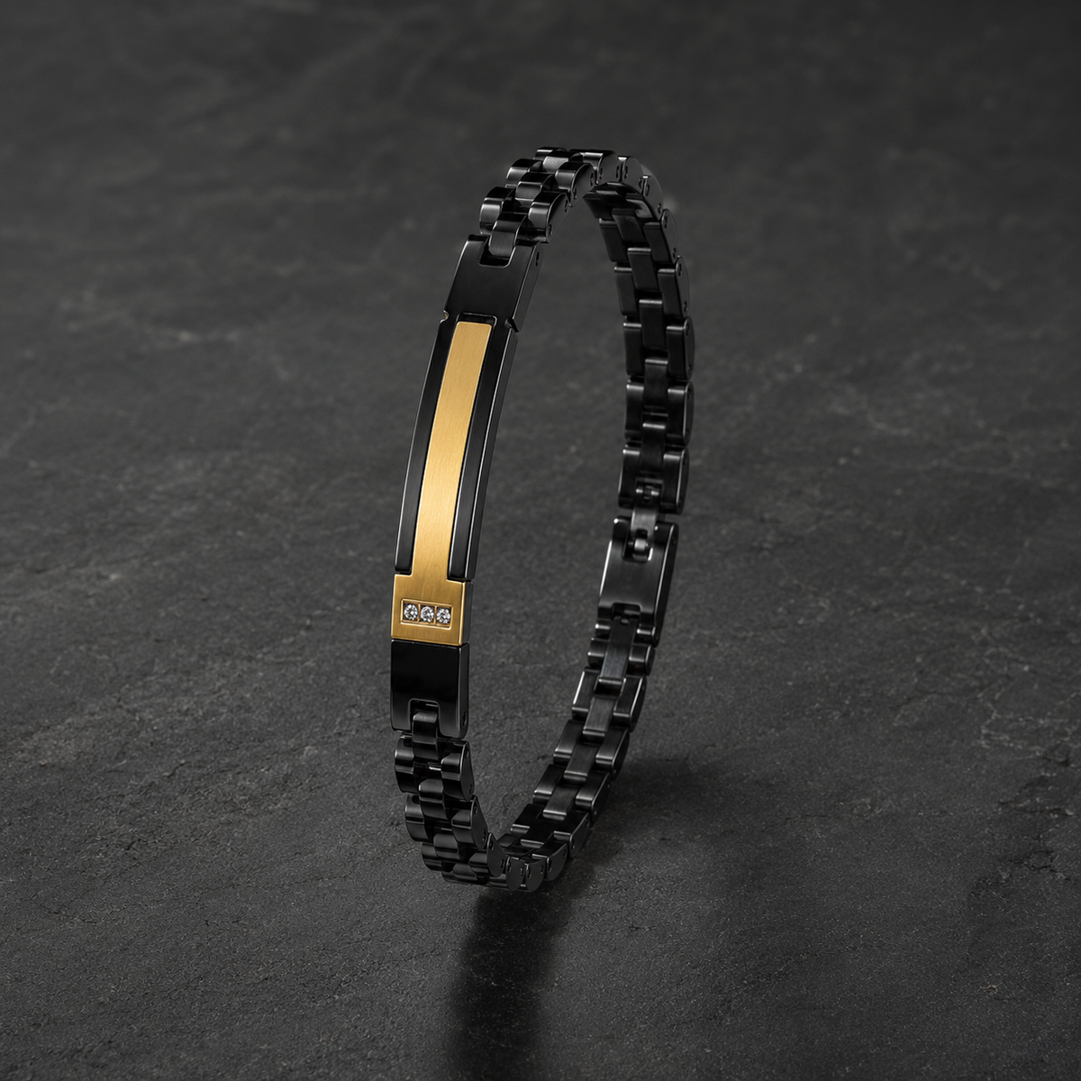 Black link bracelet with gold plate