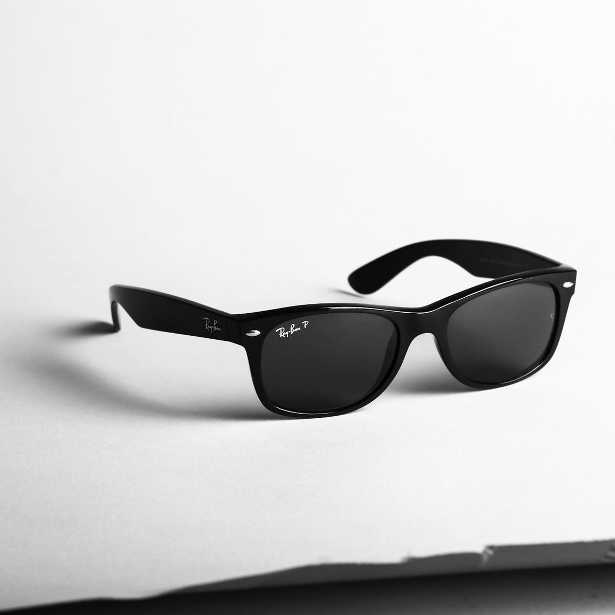 Aviator sunglasses on a warm background